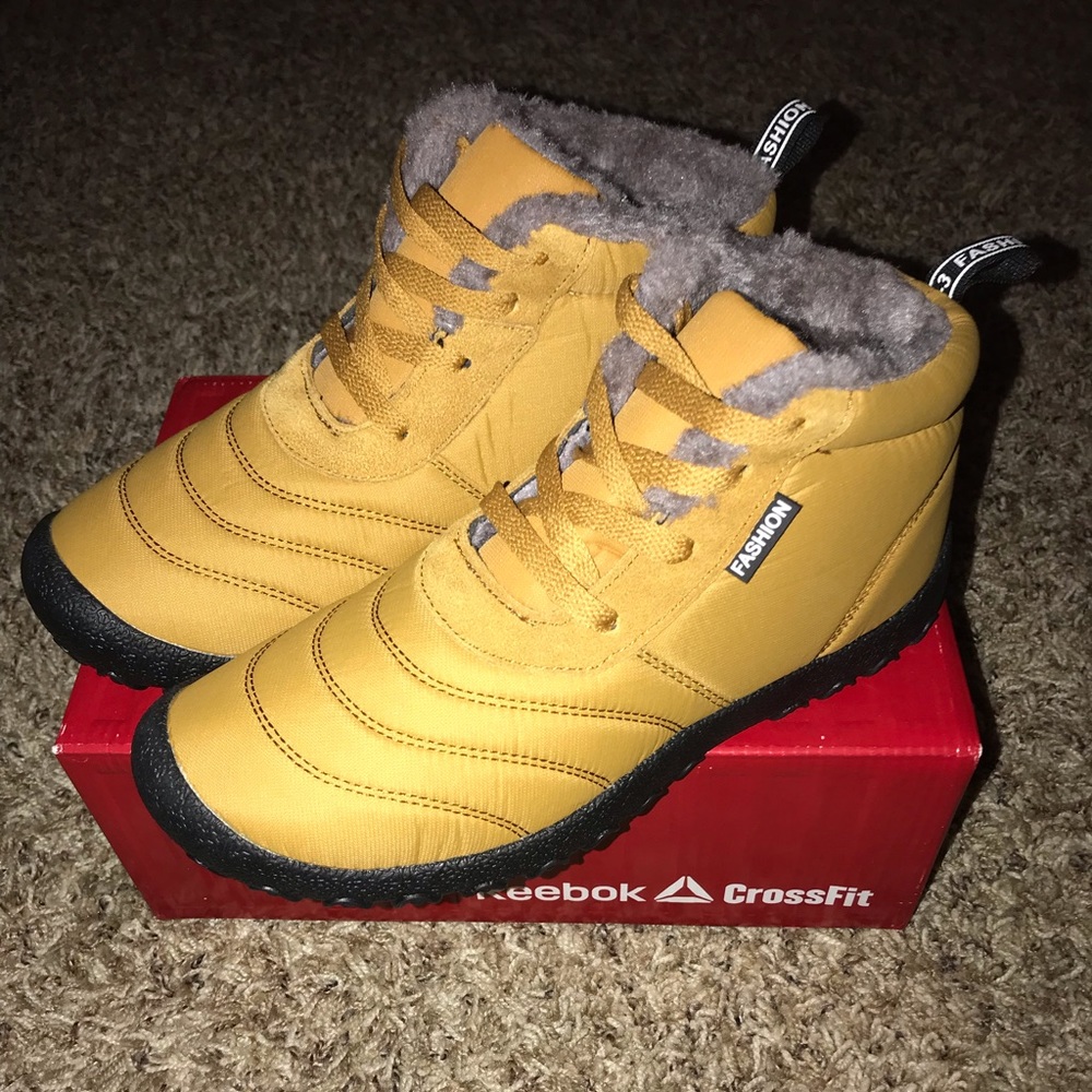 New, size 39(size 9) Carmel/grey fur boot